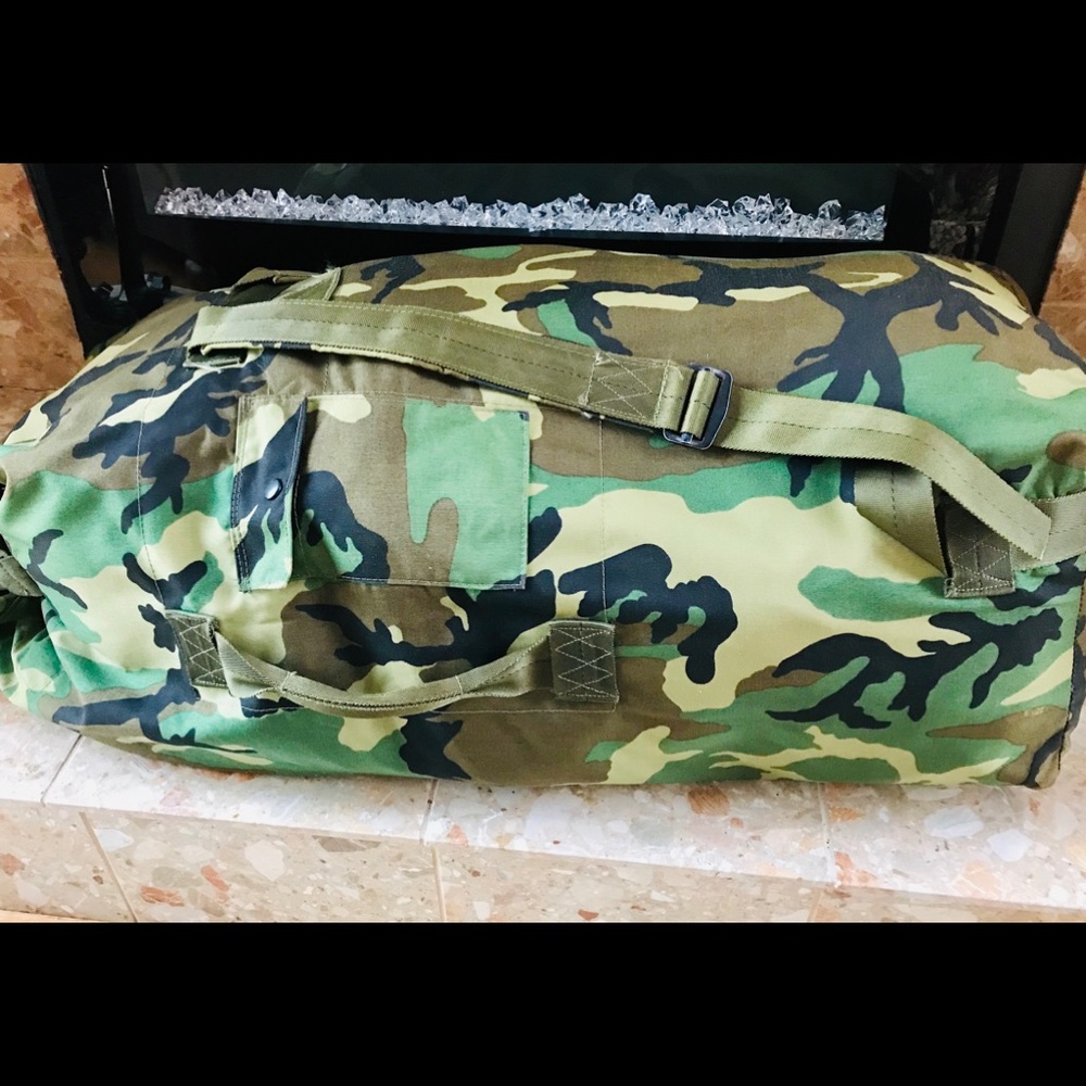 Large and medium camouflage duffel bags